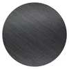 A round, black side table with a textured surface. Náhľad obrázku produktu