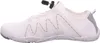 A side view of a white casual shoe. Podgląd zdjęcia produktu