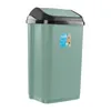 A green trash can with a black lid against a white background. Náhľad obrázku produktu