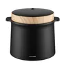 A studio product shot of a black and wood rice cooker. Voir les images du produit