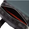 A close-up view of the interior of a black messenger bag with a geometric pattern. Anteprima dell’immagine prodotto