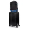 A black suitcase with a black and blue backpack on top, isolated on a white background. Náhled obrázku produktu
