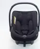 A black baby car seat is shown against a white background. Produktbild-Vorschau