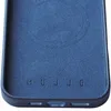 Close-up view of the interior of a dark blue phone case, showing embossed branding and a circular outline for MagSafe. Podgląd zdjęcia produktu