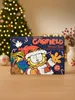 A Garfield-themed advent calendar with socks, placed in front of a decorated Christmas tree. Produktbild-Vorschau