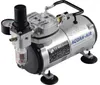 A silver and black airbrush compressor with a pressure gauge and regulator. Produktbild-Vorschau