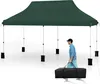 A man is walking with a black carrying bag in front of a large green pop-up tent. Produktbild-Vorschau