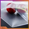 A close-up of vacuum sealing bags with red cherries inside. Podgląd zdjęcia produktu