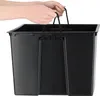 Hands holding the handles of a black plastic planter. Náhľad obrázku produktu