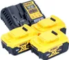 A DeWALT battery charger and three batteries are arranged on a white background. Náhled obrázku produktu