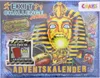 The image shows the front of a board game box, featuring a pharaoh's mask and other Egyptian-themed graphics. Anteprima dell’immagine prodotto