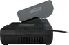 A black battery charger with a battery inserted at an angle. Produktbild-Vorschau