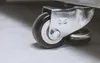 A close-up shot of a caster wheel on a piece of equipment, likely part of the GORILLER® BLACKBACK M8 Outdoor-Küche. Produktbild-Vorschau