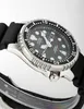 A close-up, angled shot of a black and silver Citizen Promaster dive watch with a black rubber strap. Produktbild-Vorschau