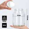 A hand holds a lid above a glass jar, with measurement indicators and weight information displayed next to it. Anteprima dell’immagine prodotto