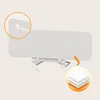 A white bed rail with a logo and a diagram of its layered material. Voir les images du produit