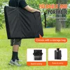 A person carrying a folded camping bench in a storage bag outdoors. Anteprima dell’immagine prodotto