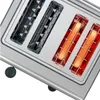 Close-up view of a stainless steel toaster with four slots. Two slots show glowing heating elements in red and orange, while the other two are empty and show dark interior elements. Anteprima dell’immagine prodotto