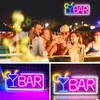 A collage of images showing people enjoying drinks at a bar and close-ups of neon "BAR" signs. Voir les images du produit
