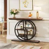 A console table with a circular shelf unit is displayed in a well-lit room, showcasing decorative items. Anteprima dell’immagine prodotto