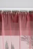 A close-up view of a burgundy sheer curtain hanging from a curtain rod. Produktbild-Vorschau