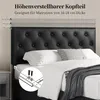 A close-up view of a black upholstered headboard with tufted buttons, part of a bed. Dimensions are indicated with measurement lines and text. Produktbild-Vorschau