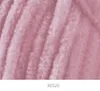 A close-up of textured pink yarn. Náhľad obrázku produktu