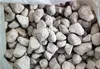 A pile of light-colored, porous stones, likely pumice, filling a white bag. Produktbild-Vorschau