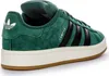 A side view of a green Adidas Campus sneaker with black stripes and a white sole. Produktbild-Vorschau