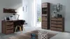 A modern bedroom or home office setup with a desk, chair, bookshelf, and chest of drawers. Anteprima dell’immagine prodotto