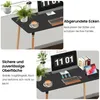 Two close-up views of a black desk with wooden legs, showing its features and details. Voir les images du produit
