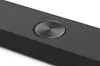 A close-up view of the top surface of a black soundbar. Anteprima dell’immagine prodotto