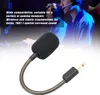 A close-up of a microphone with a flexible gooseneck and a 3.5mm jack, set against a blurred background of people playing video games. Produktbild-Vorschau