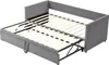 A grey upholstered sofa bed with the mattress extended, showing the slatted base. Produktbild-Vorschau