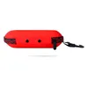 A red protective case for swimming goggles, shown from the side. Anteprima dell’immagine prodotto