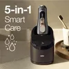 A Braun Series 9 Pro electric shaver is shown in its charging and cleaning station, with text overlay highlighting its features. Produktbild-Vorschau