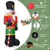 An inflatable nutcracker soldier with accompanying marketing graphics and text. Produktbild-Vorschau