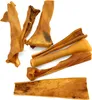 A collection of dried pig ears for dogs, arranged on a white background. Produktbild-Vorschau