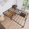 A metal bed frame is shown in a room with a window and some decorative items. Produktbild-Vorschau