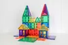 A colorful magnetic building set arranged in the shape of a castle with smaller houses in front. Produktbild-Vorschau