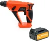 An orange and black cordless hammer drill with a separate battery pack, displayed on a white background. Podgląd zdjęcia produktu