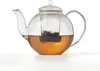 A clear studio shot of a glass teapot filled with tea. Produktbild-Vorschau