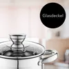 A close-up of a stainless steel pot with a glass lid. Náhled obrázku produktu