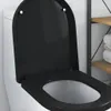 A close-up view of a black toilet seat and lid on a white toilet. Náhled obrázku produktu