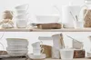 Kitchenware displayed on shelves. Produktbild-Vorschau
