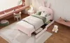 A child's bedroom with a pink bed, desk, and chair. Náhled obrázku produktu