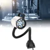 A CNC machine in the background with a flexible LED work light in the foreground. Podgląd zdjęcia produktu