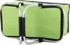 A green picnic basket with a silver frame and black handles is shown from a side angle. Náhled obrázku produktu