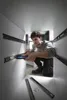 A man is installing drawer slides inside a cabinet. Voir les images du produit