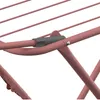 A close-up view of a pink drying rack, focusing on the joint mechanism. Produktbild-Vorschau
